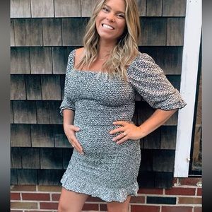 Pink blush mini smocked black and white dress